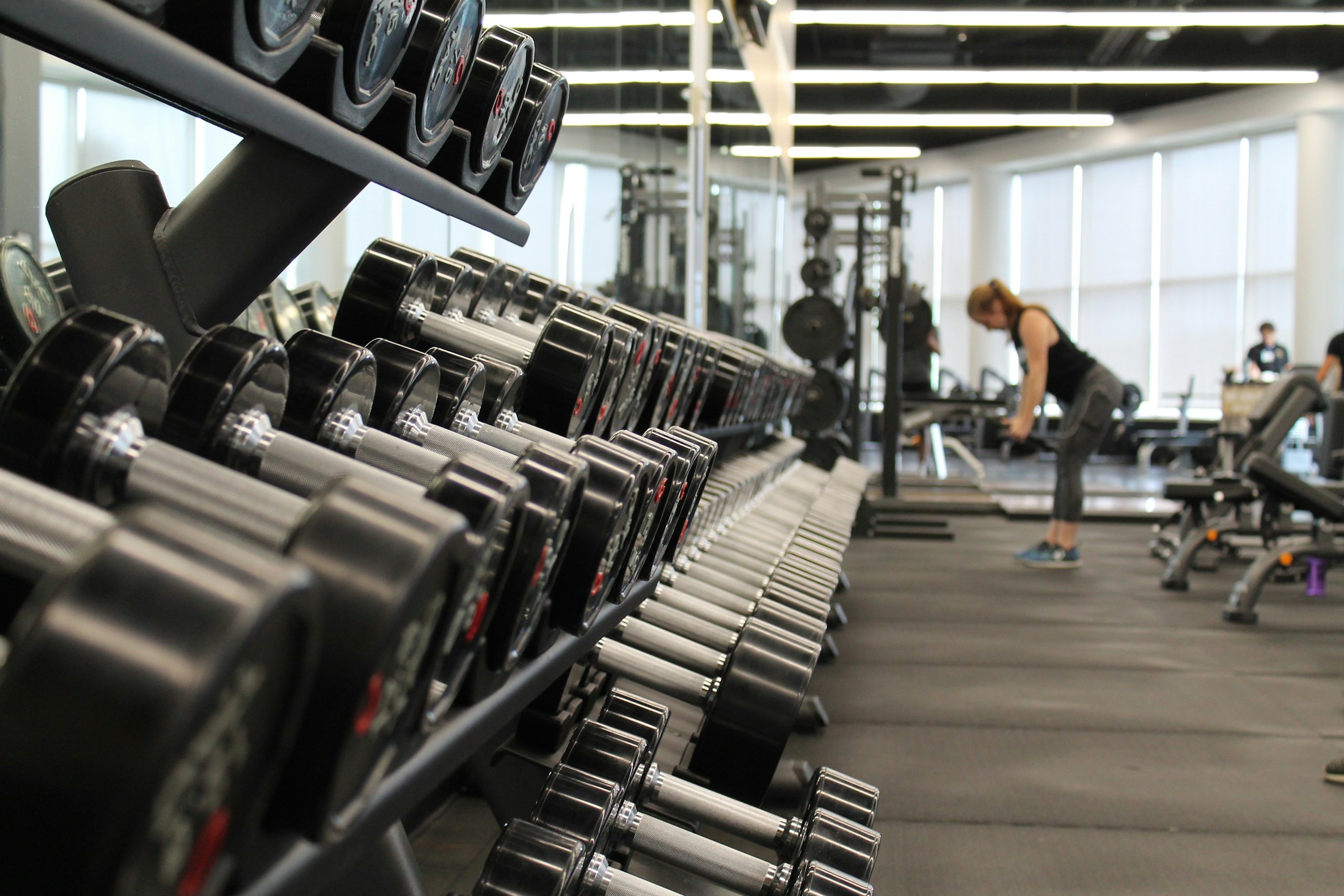 Open training floor with strength and conditioning equipment